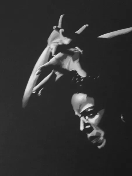 Visage émergeant de l'obscurité, clair-obscur noir et blanc